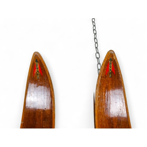 37 - A pair of vintage wooden skis by Bonna - with Telemark bindings, 206cm long.