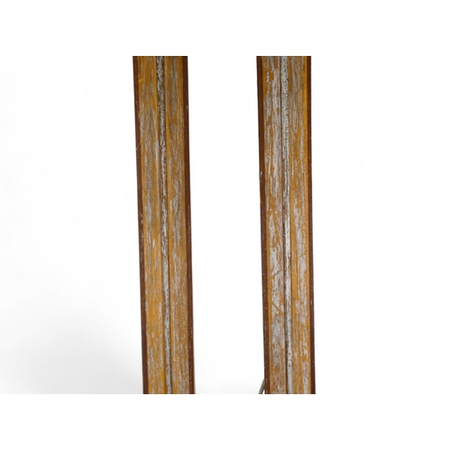 37 - A pair of vintage wooden skis by Bonna - with Telemark bindings, 206cm long.