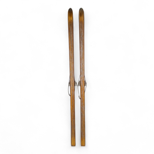 37 - A pair of vintage wooden skis by Bonna - with Telemark bindings, 206cm long.