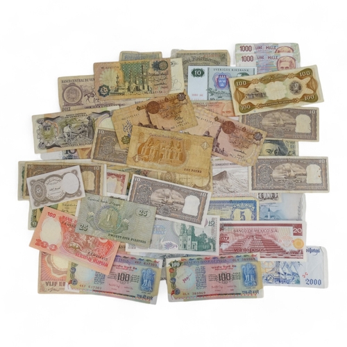 373 - A quantity of foreign banknotes - to include Argentina, Brazil, Egypt, France, India, Venezuela, Ind... 