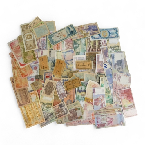 377 - A quantity of British and foreign banknotes - to include Scotland, Guernsey, Hong Kong, Spain, Franc... 