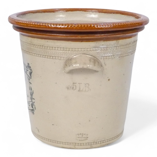 39 - An early 20th century glazed stoneware butter crock - 5lb from the Buttercup Dairy Co., 18cm high, t... 