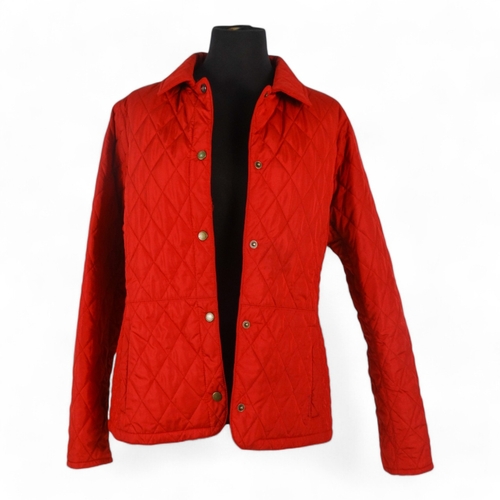 394 - A Barbour red quilted jacket - size 14/16, length 63cm.