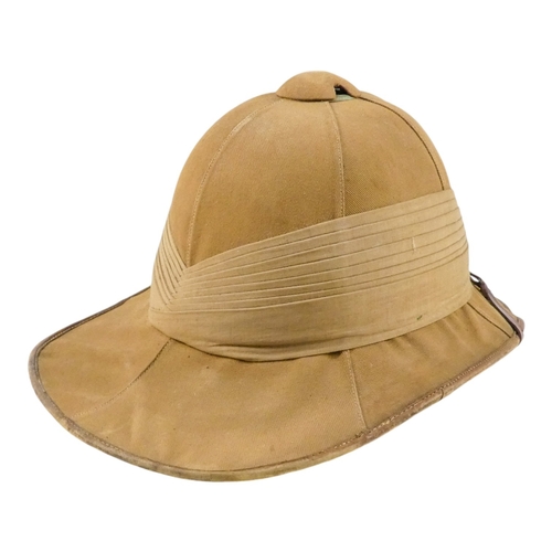 432 - A Wolseley pattern khaki solar top hat - by Christy's London 'for the tropics', size 6 5/8 with Davi... 