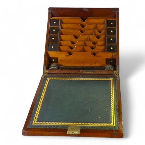 45 - A Victorian mahogany table top stationery cabinet - with countersunk brass handles and an apron draw... 