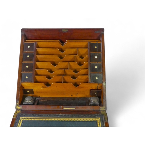 45 - A Victorian mahogany table top stationery cabinet - with countersunk brass handles and an apron draw... 