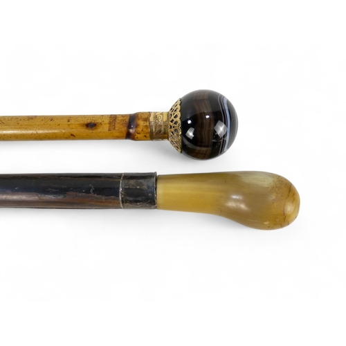 48 - A late 19th century walking cane - with globe hardstone knop set in gilt metal, stamped 'Antoine Pal... 