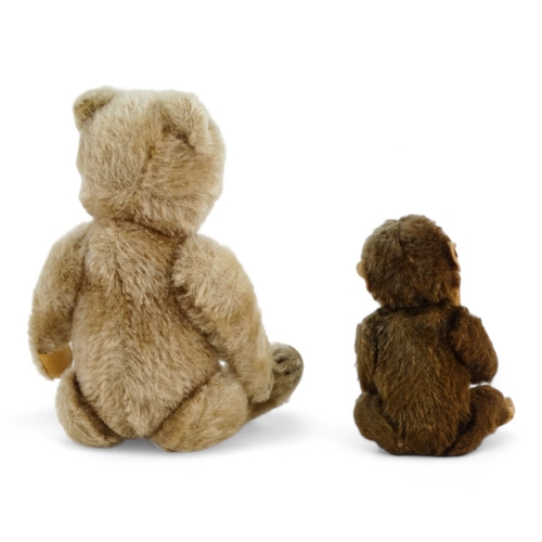 515 - An early 20th century mohair teddy bear - with articulated arms and legs, 21cm high, together with a... 