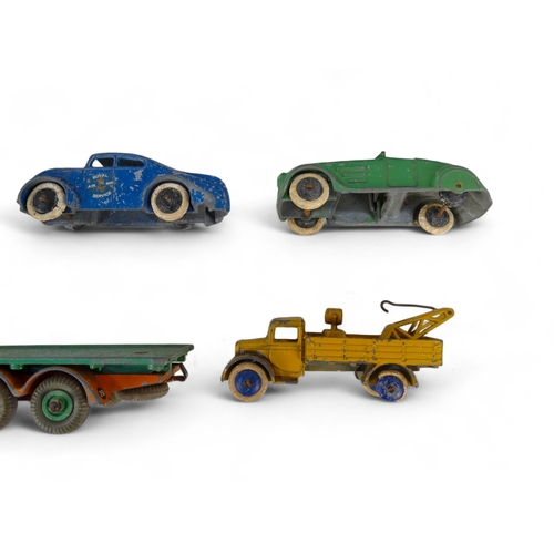 516 - A small quantity of Dinky vehicles - including a Foden flat-bed truck, Ferrari racer and a fire engi... 