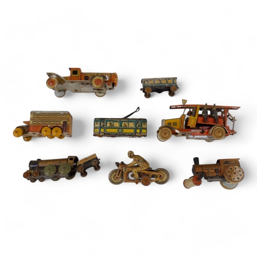 517 - A small quantity of early 20th century German tin plate clockwork toys - with lithographic decoratio... 