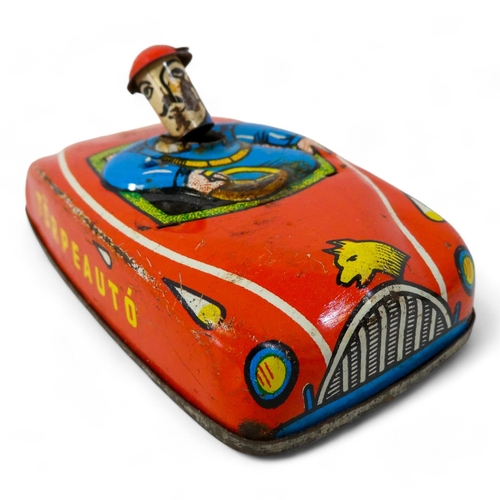 520 - A vintage Mobo tinplate tortoise - decorated in yellow and red, 29cm wide, together with a tinplate ... 