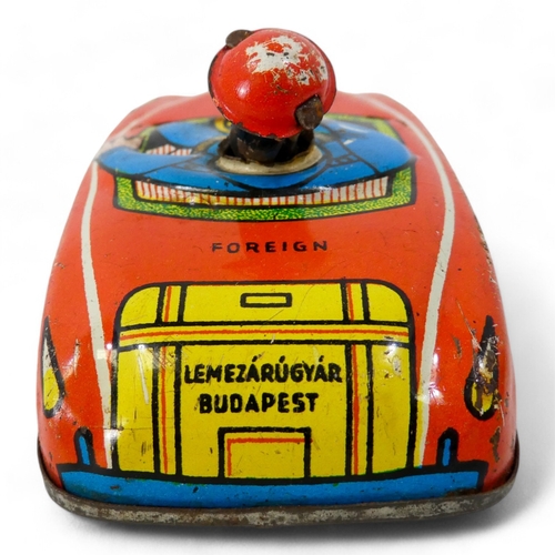 520 - A vintage Mobo tinplate tortoise - decorated in yellow and red, 29cm wide, together with a tinplate ... 