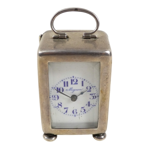 521 - An early 20th century silver cased timepiece - Birmingham 1901, the white enamel dial signed Mignon ... 