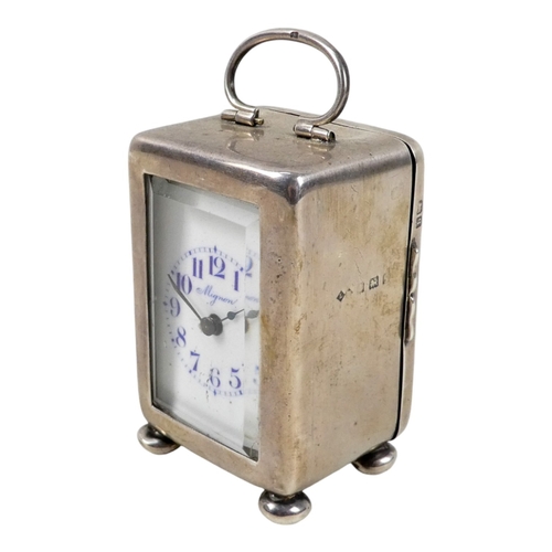 521 - An early 20th century silver cased timepiece - Birmingham 1901, the white enamel dial signed Mignon ... 