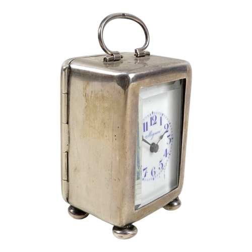 521 - An early 20th century silver cased timepiece - Birmingham 1901, the white enamel dial signed Mignon ... 