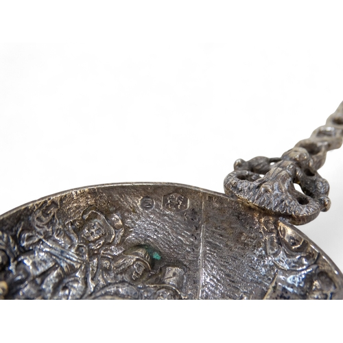 524 - A late 19th century Dutch white metal spoon - with a figural cast bowl and handle with  ship termina... 