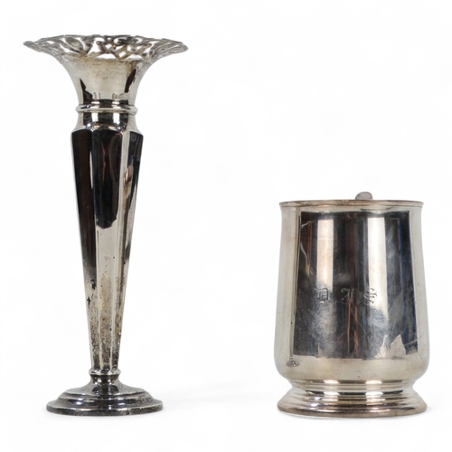 525 - A silver stem vase - Sheffield 1904, with pierced rim and octagonal tapering body on a weighted circ... 