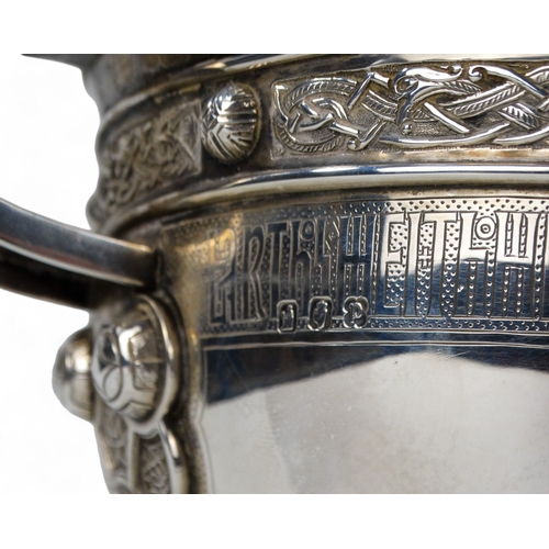 527 - A large Britannia silver bowl - Dublin 1930, with twin handles and Celtic strapwork decoration, rais... 