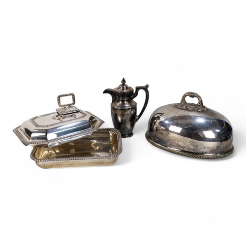 581 - A small quantity of silver plated ware - including an oval domed cloche, a hot water jug, an entree ... 