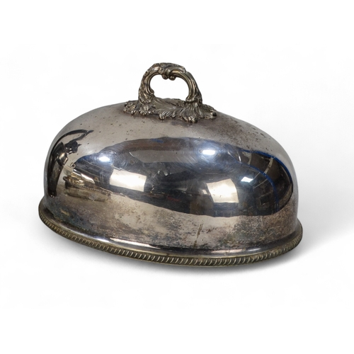 581 - A small quantity of silver plated ware - including an oval domed cloche, a hot water jug, an entree ... 