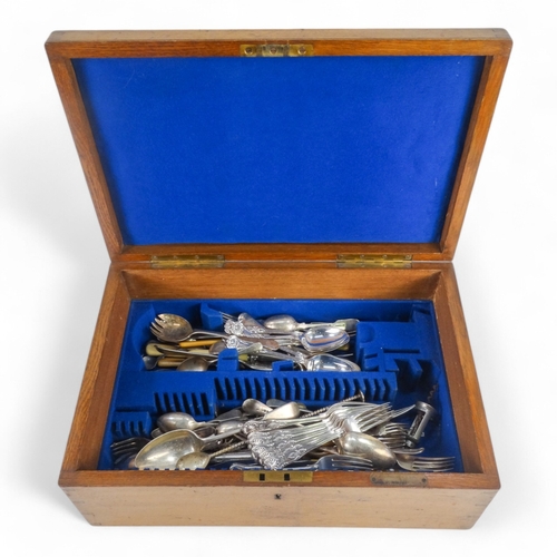 584 - A 20th century oak canteen of plated cutlery - mixed service of sundry items, the case fitted with b... 