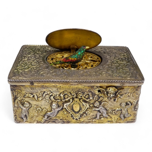 61 - A fine 19th century Swiss silver gilt music box - the rectangular top with strapwork design and hing... 