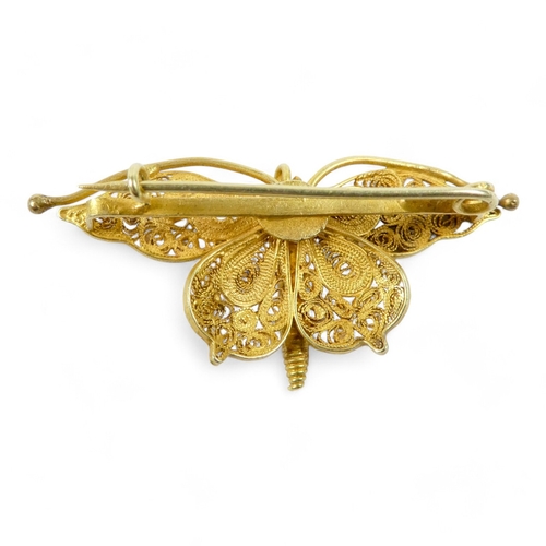 618 - A gilt filigree butterfly brooch - probably high carat gold, 3.5g.