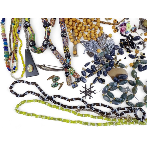 619 - A small quantity of costume jewellery - mostly necklaces.