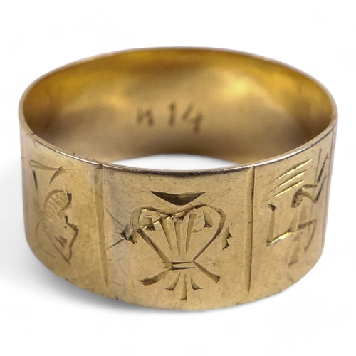 620 - A 14ct gold ring - engraved with symbols, together with a 9ct gold tie pin modelled as a horseshoe a... 