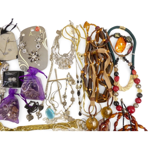 626 - A quantity of costume jewellery - including necklaces bangles and brooches.