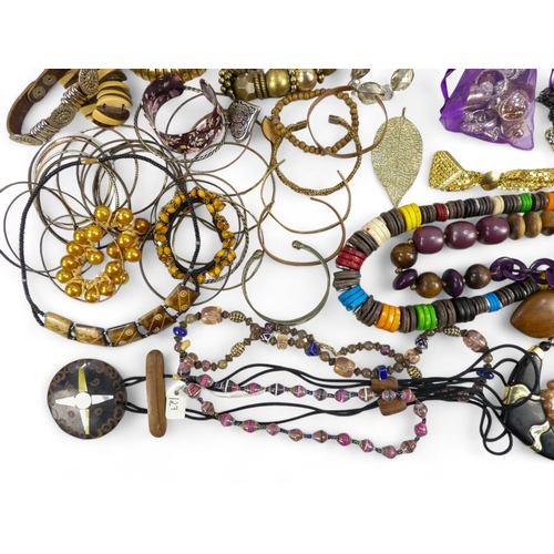 626 - A quantity of costume jewellery - including necklaces bangles and brooches.