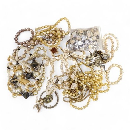 628 - A quantity of costume jewellery - including necklaces, bangles and brooches.