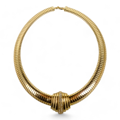 635 - A vintage Christian Dior gilt necklace - of articulated 'snake' form and set with white stones to a ... 