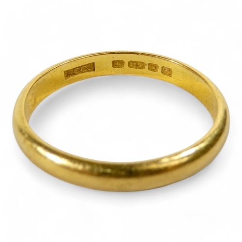 642 - A 22ct gold wedding band - size R, 4.2g, together with another size L, 2.6g.