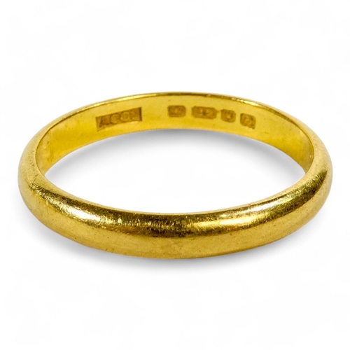 642 - A 22ct gold wedding band - size R, 4.2g, together with another size L, 2.6g.