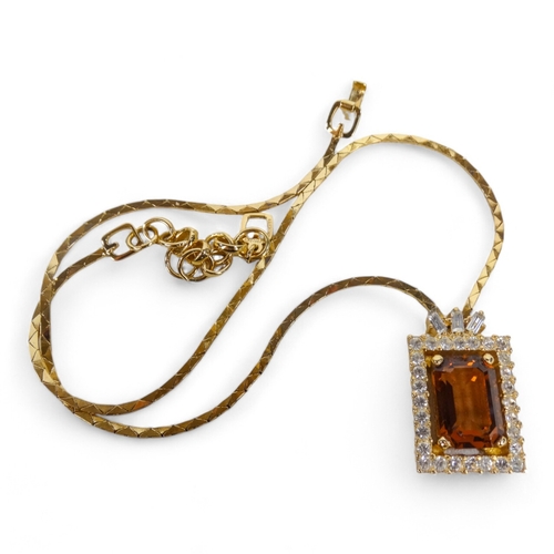 649 - A Grosse for Dior yellow metal necklace - set with a central faceted brown stone and surrounded by p... 