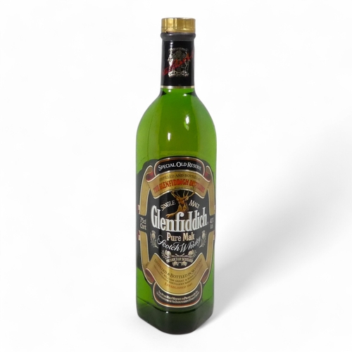 65 - A bottle of Glenfiddich whisky - 750ml, Special Reserve, with original presentation tin.