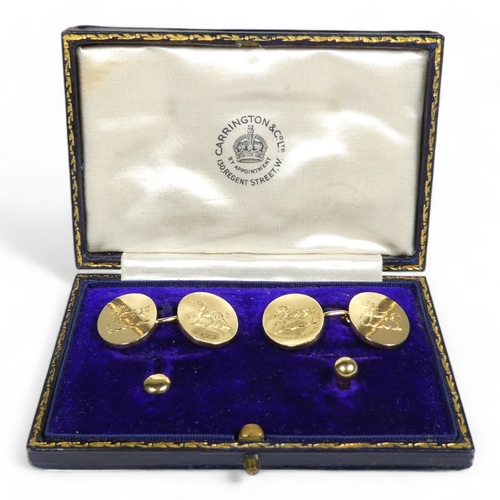 651 - A pair of 18ct gold cufflinks - boxed with a pair of shirt studs, the oval 'buttons' engraved with a... 