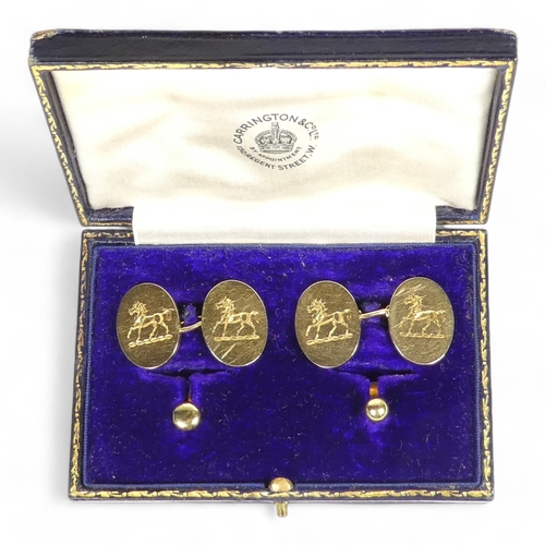 651 - A pair of 18ct gold cufflinks - boxed with a pair of shirt studs, the oval 'buttons' engraved with a... 