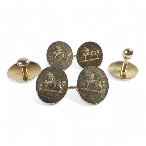 651 - A pair of 18ct gold cufflinks - boxed with a pair of shirt studs, the oval 'buttons' engraved with a... 