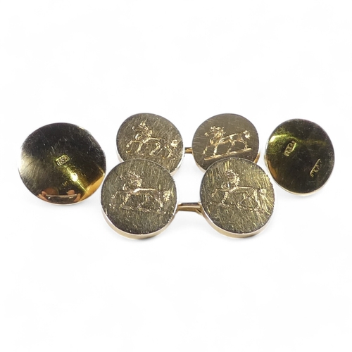 651 - A pair of 18ct gold cufflinks - boxed with a pair of shirt studs, the oval 'buttons' engraved with a... 