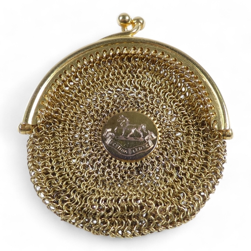 657 - A 15ct gold mesh sovereign purse - the clasp fitted with a suspension loop, the bag with a central d... 