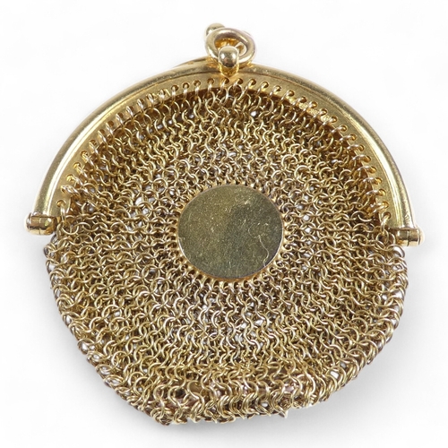 657 - A 15ct gold mesh sovereign purse - the clasp fitted with a suspension loop, the bag with a central d... 