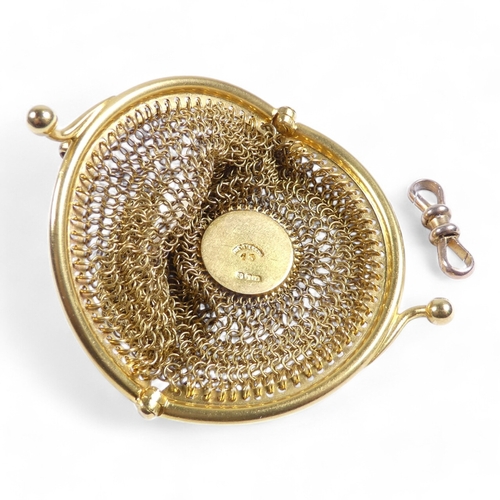 657 - A 15ct gold mesh sovereign purse - the clasp fitted with a suspension loop, the bag with a central d... 