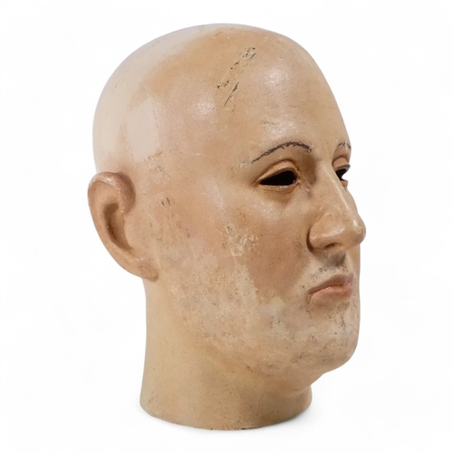 66 - An early 20th century mannequin head - with open eyes and emblazoned 'Shakespeare' to the rear, 27cm... 