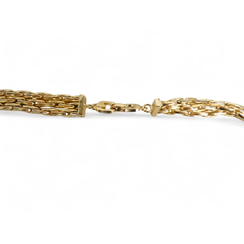 660 - Grosse for Dior, a yellow metal choker three strand necklace - set brown and white stones, length 36... 