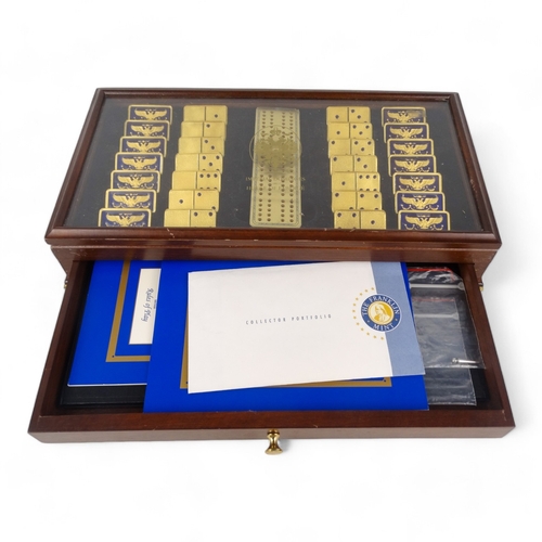 661 - A House of Faberge Imperial Dominoes set - crafted in 22ct gold plate and blue guilloche enamel, in ... 