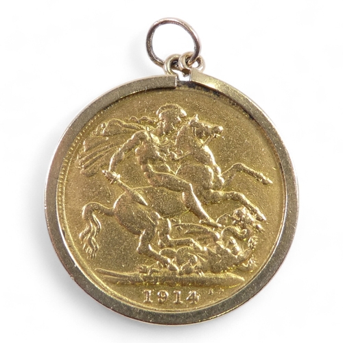 664 - A George V sovereign - 1914, within a 9ct hoop.