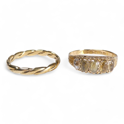 681 - A 15ct five stone ring - set with citrine (one vacant setting) with a foliate engraved band, size Q,... 