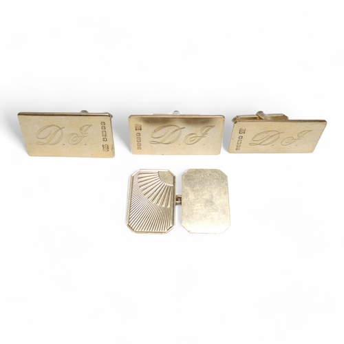 683 - A pair of 9ct gold cufflinks - rectangular and engraved with initials, together with another similar... 